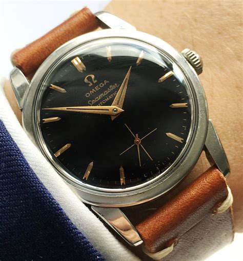 omega vintage seamaster automatic black strap